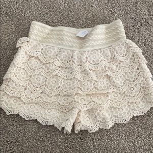 Cream crochet lace tiered shorts